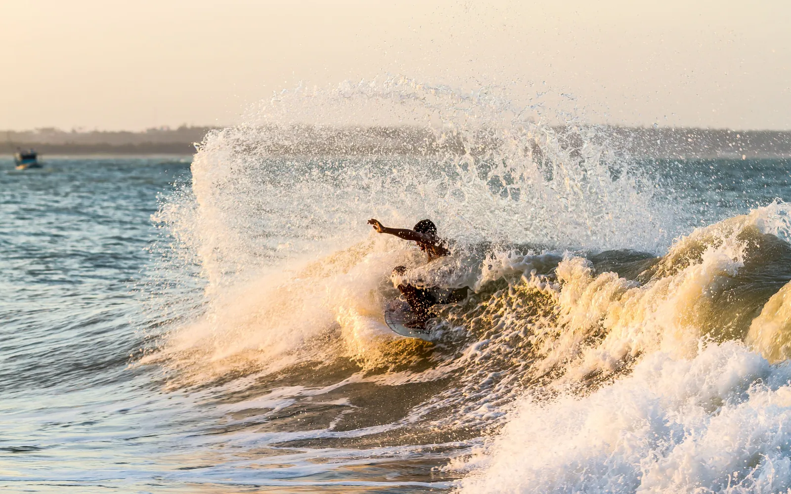 Surfer at Arugam Bay on Sri Lanka's east coast