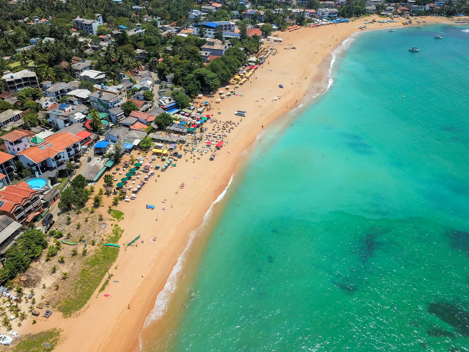 Palm-lined bay at Unawatuna on Sri Lanka's south coast